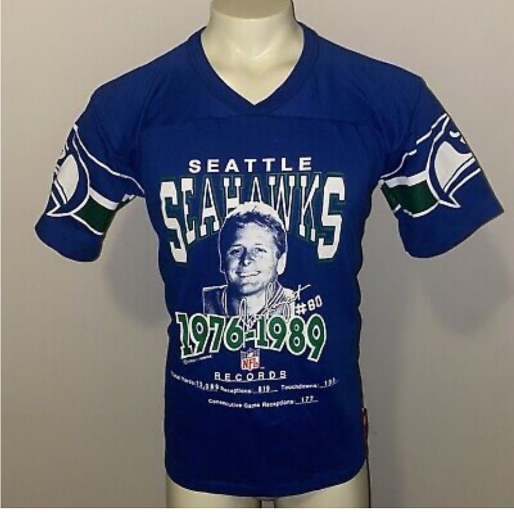 Vtg 80s Seattle Seahawks shirt
Mens L jersey Steve Largent Career
Rawlings NFL